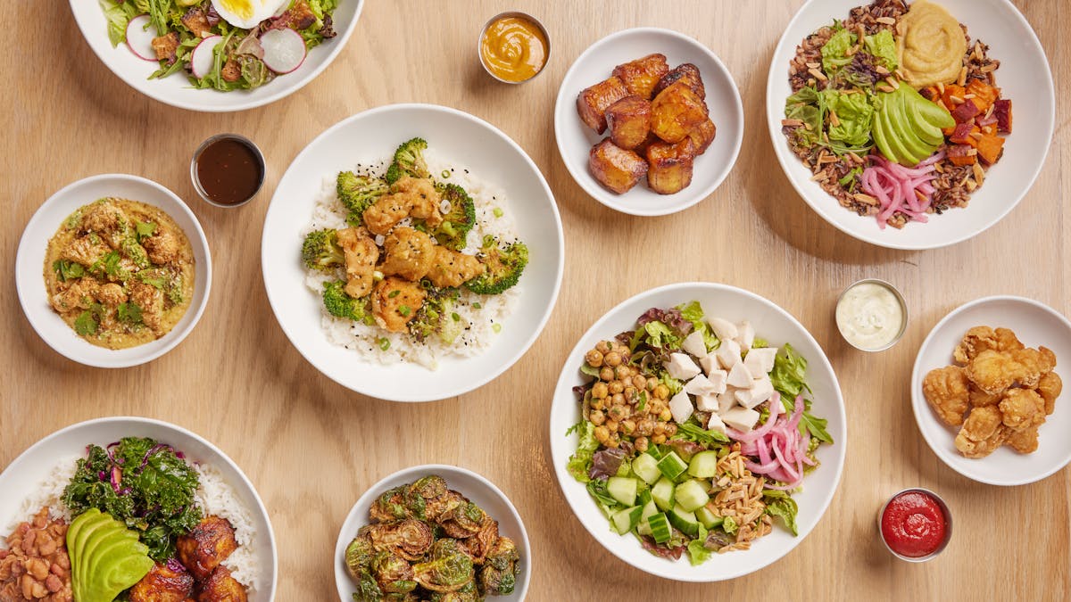 bowls filled with different types of food on a plate