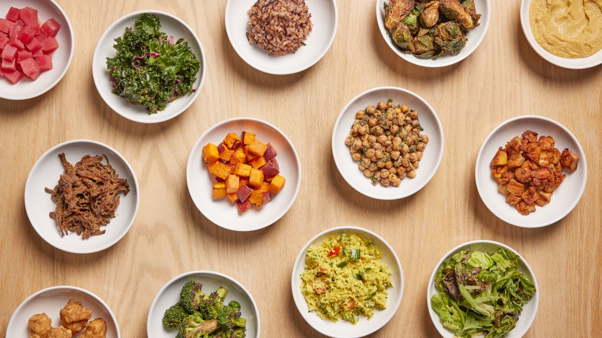 a collection of side dishes on plates