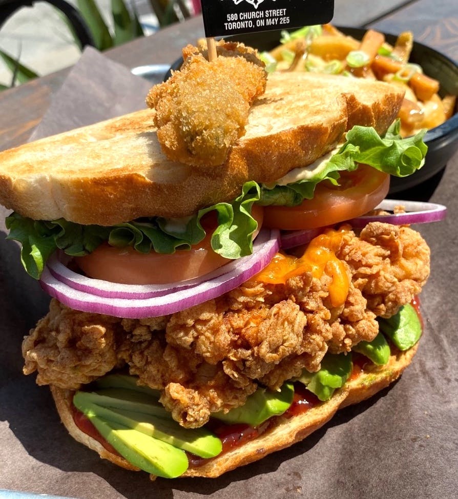 a sandwich filled with meat and vegetables