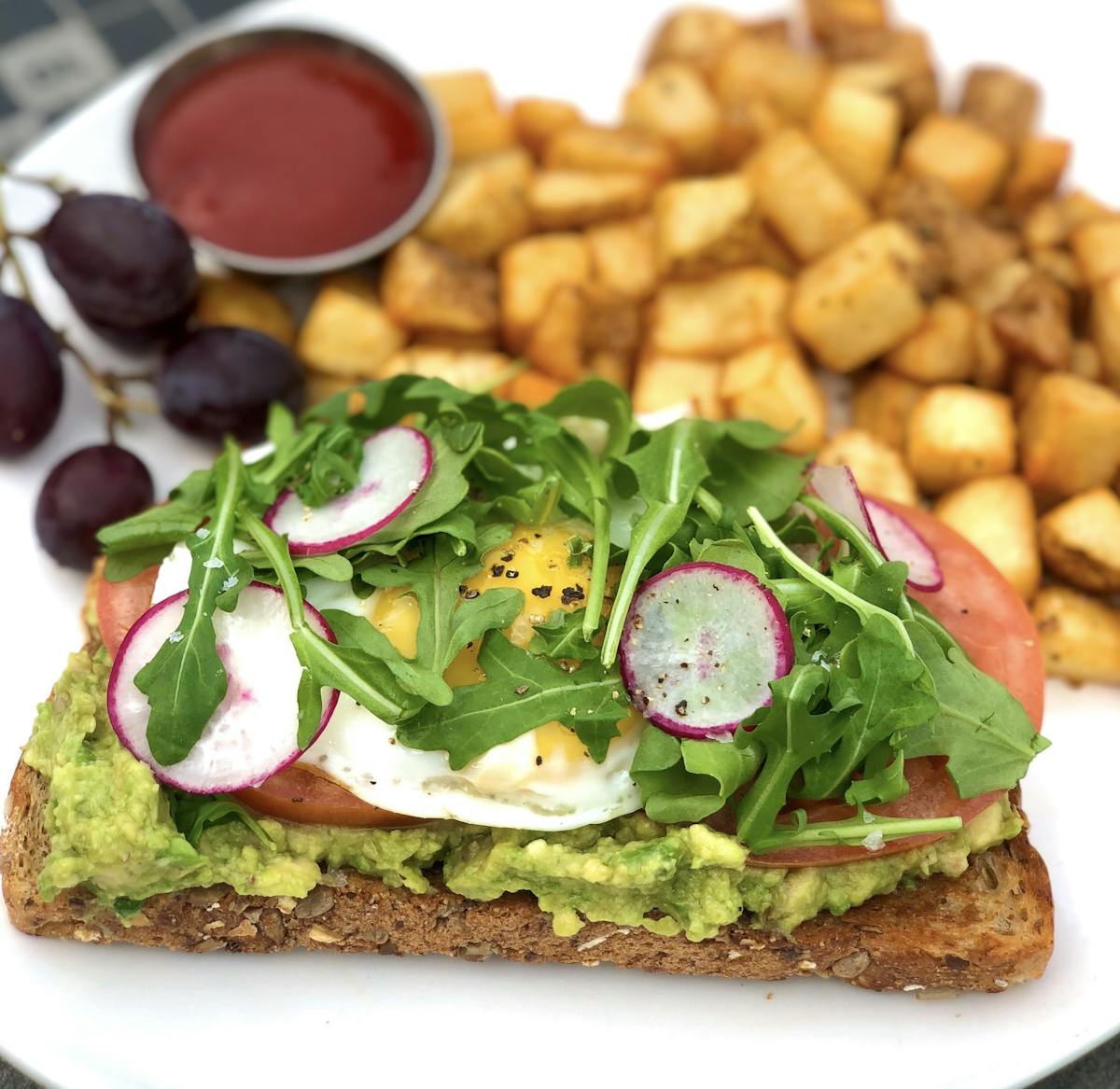 a plate of food with a sandwich and a salad