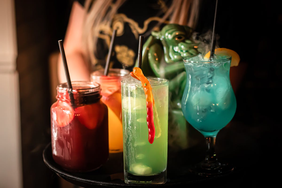 Group of cocktail drinks on a tray