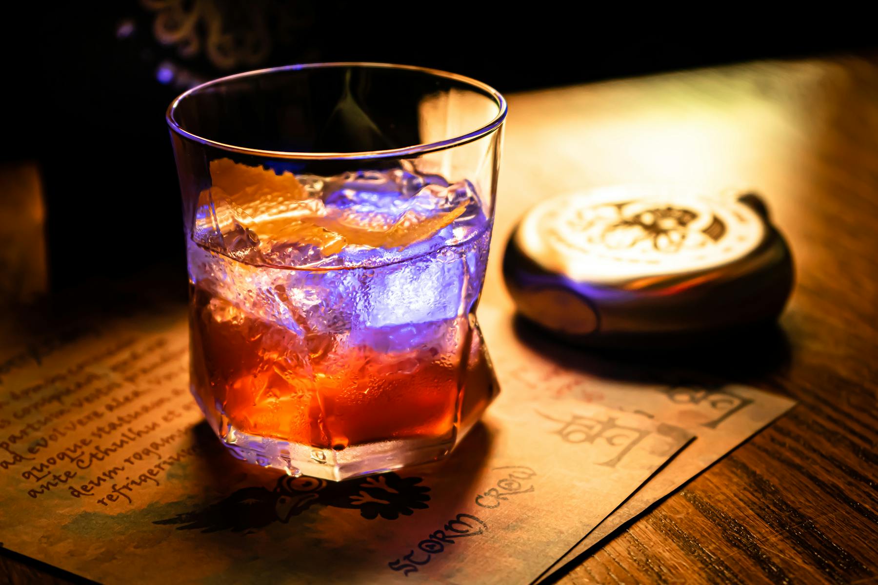 a close up of a glass cup on a table