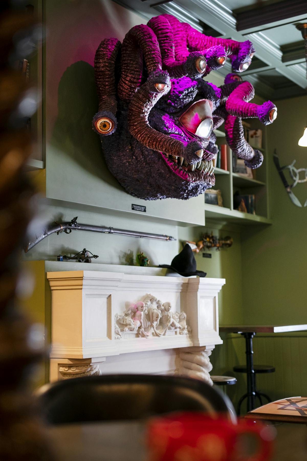 Monster head on the wall at Storm Crow Manor