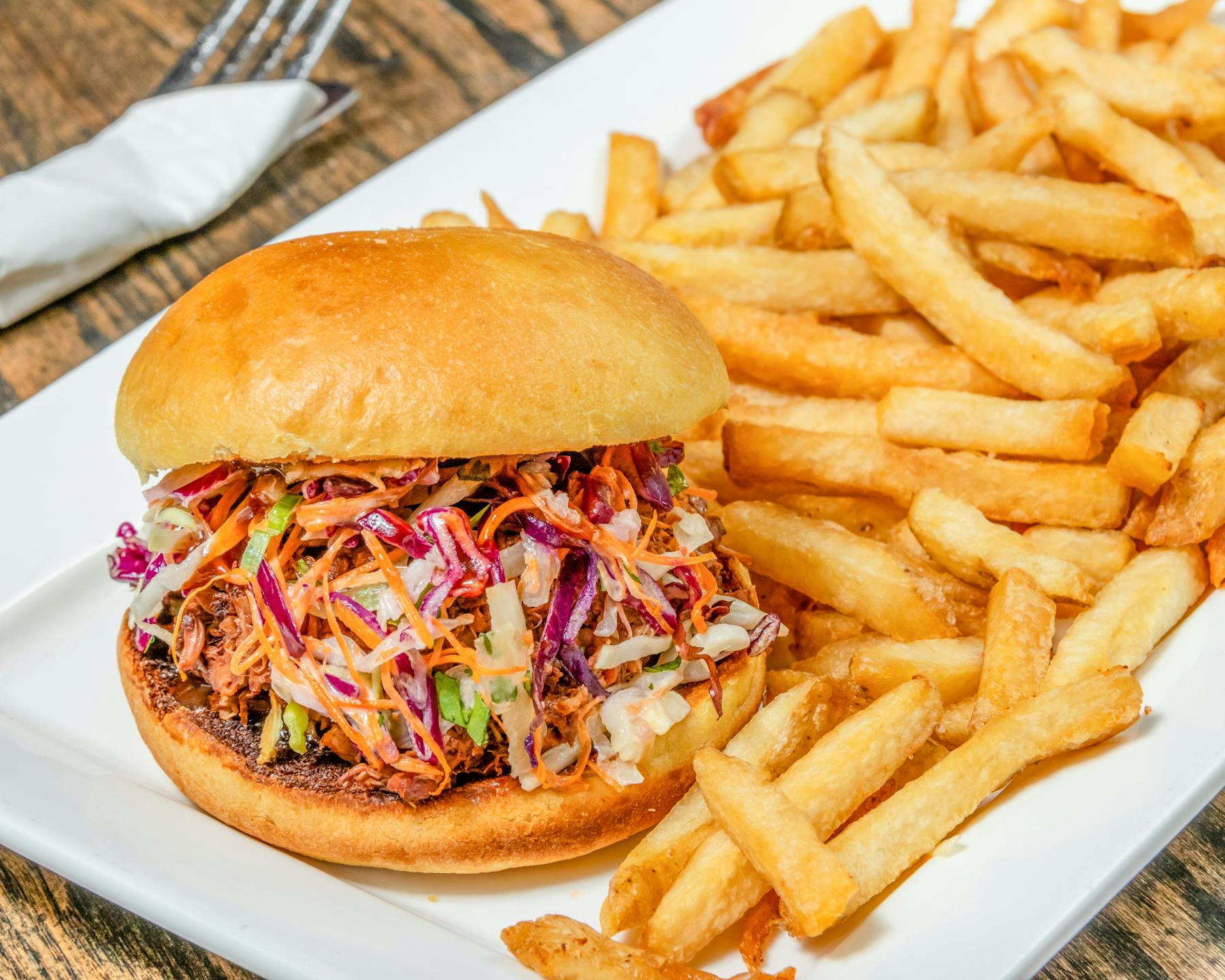 vegan pulled jackfruit sandwich with fries