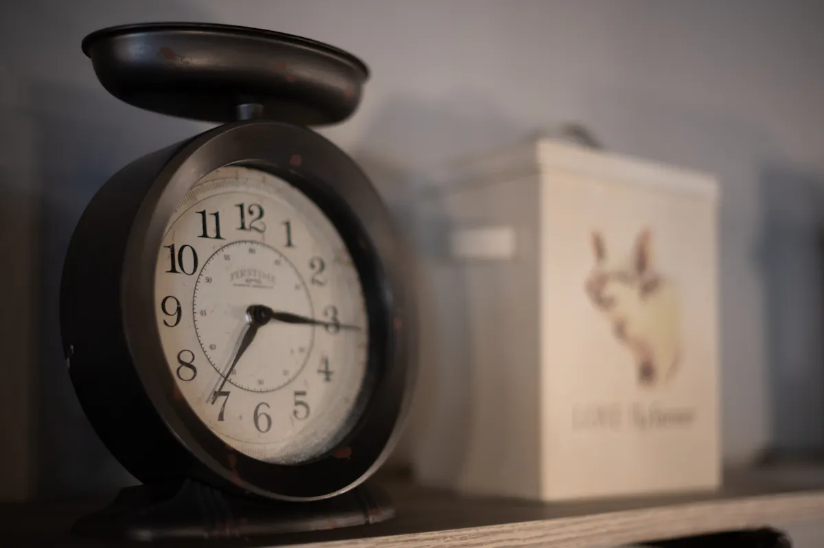 a clock sitting on top of a desk