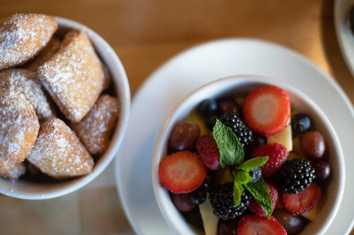 a close up of a bowl of fruit on a plate