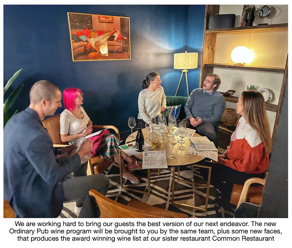 a group of people sitting at a table