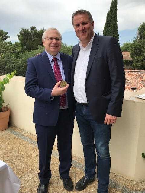 a man wearing a suit and tie