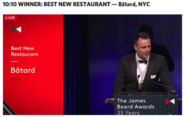 a man wearing a suit and tie