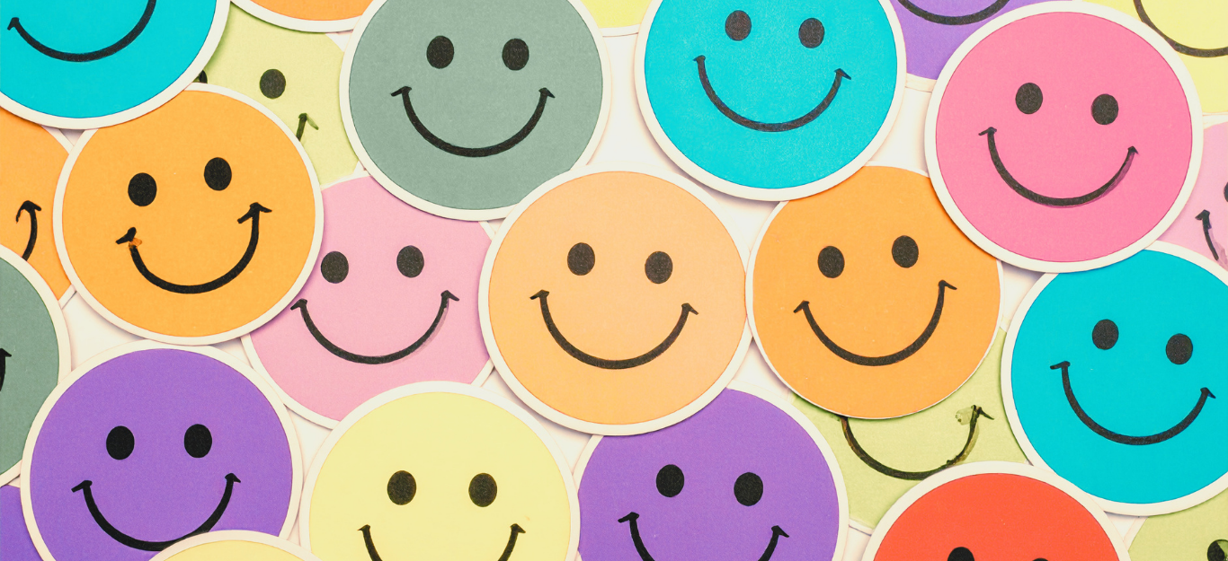 a group of colorful smiley faces