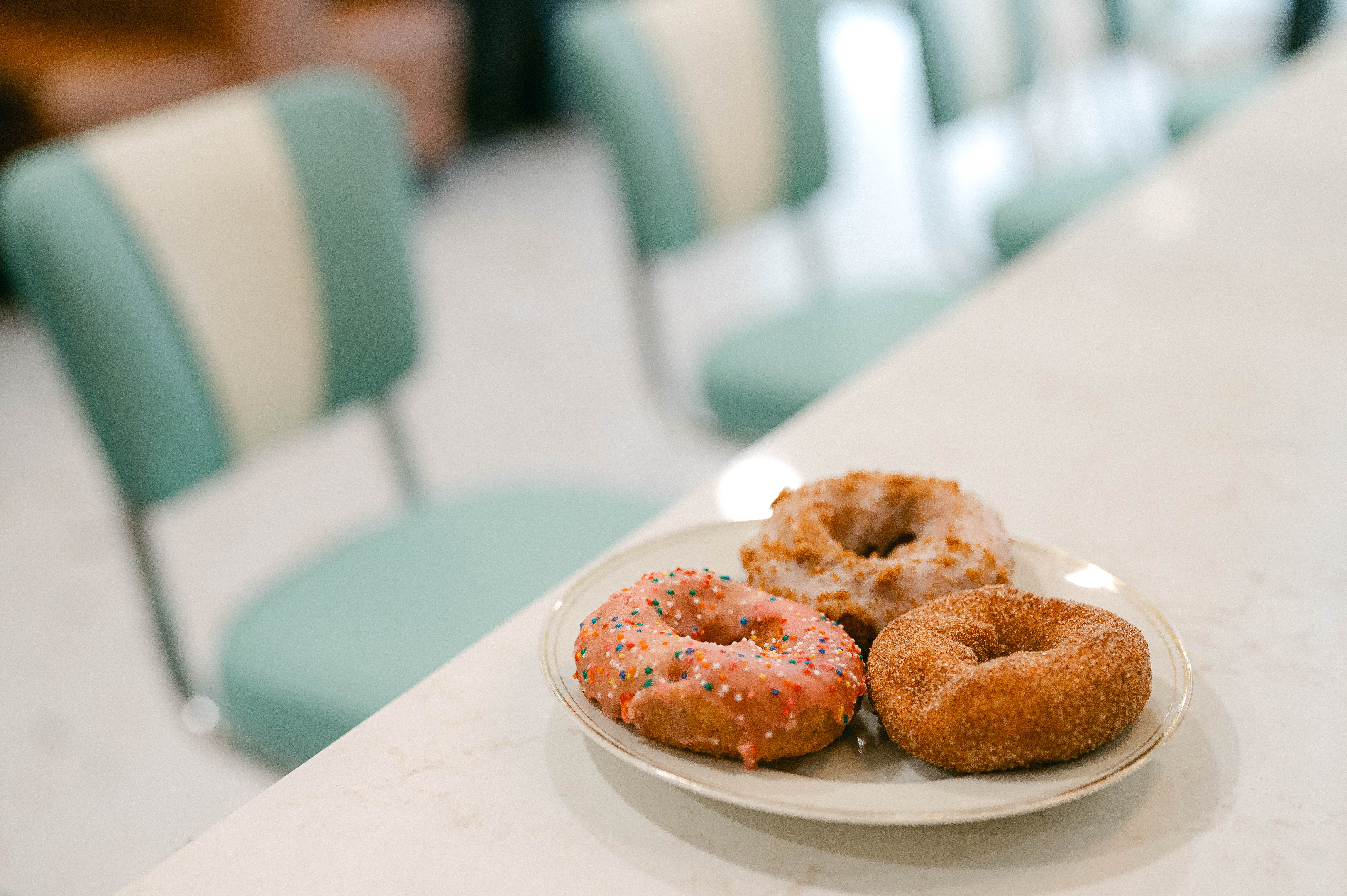 a plate of donuts on a table