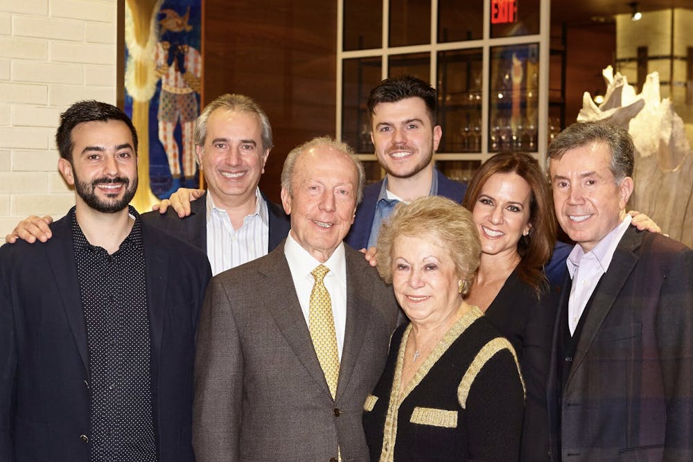 a group of people posing for a photo