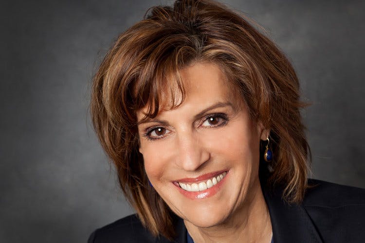 a woman smiling for the camera