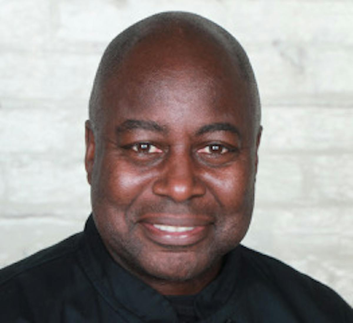 a man smiling for the camera