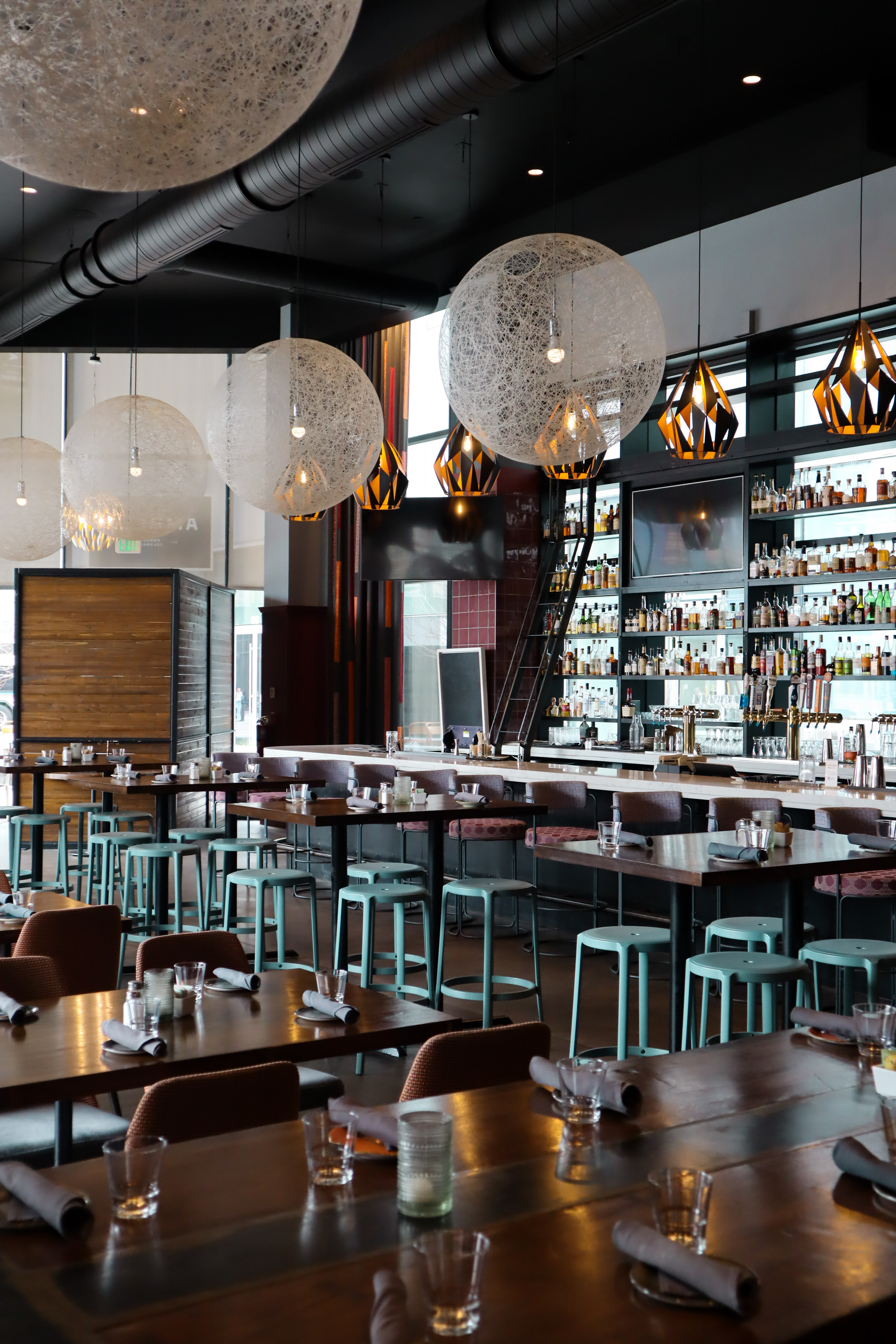 a restaurant with tables and chairs