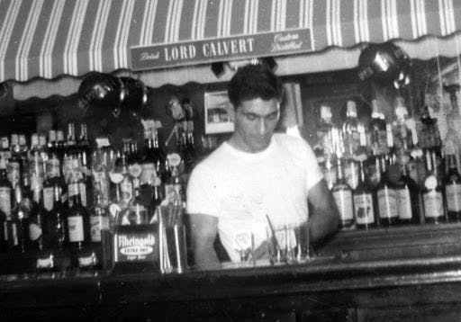 a man standing in front of a store