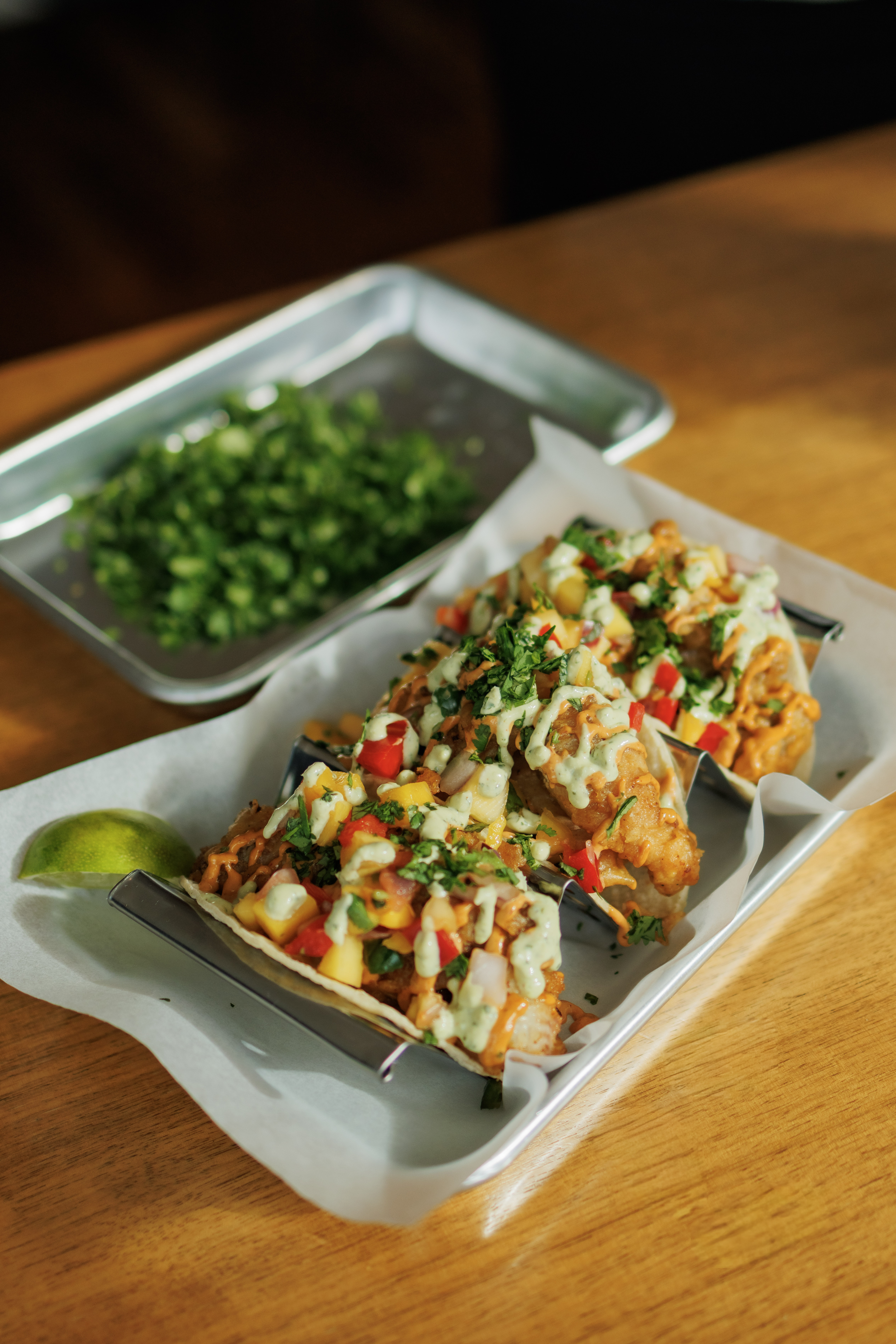 a tray of food on a plate on a table