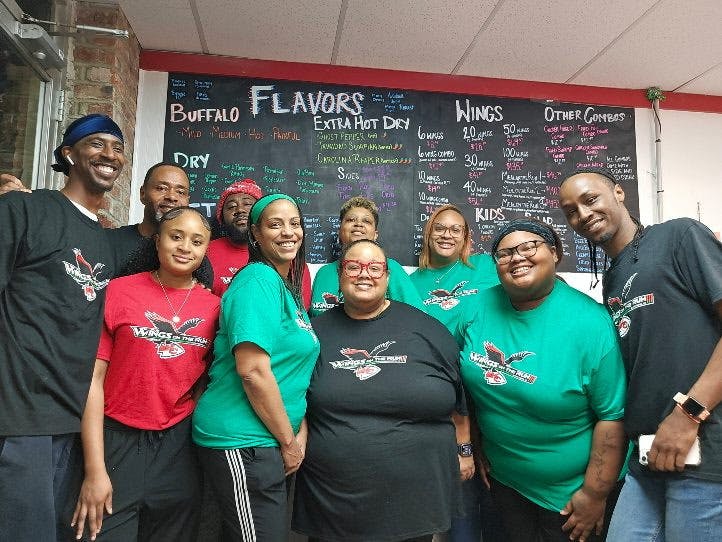 a group of people posing for a photo