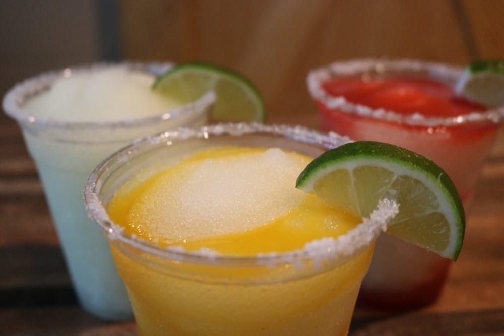 a cup of coffee and a glass of orange juice