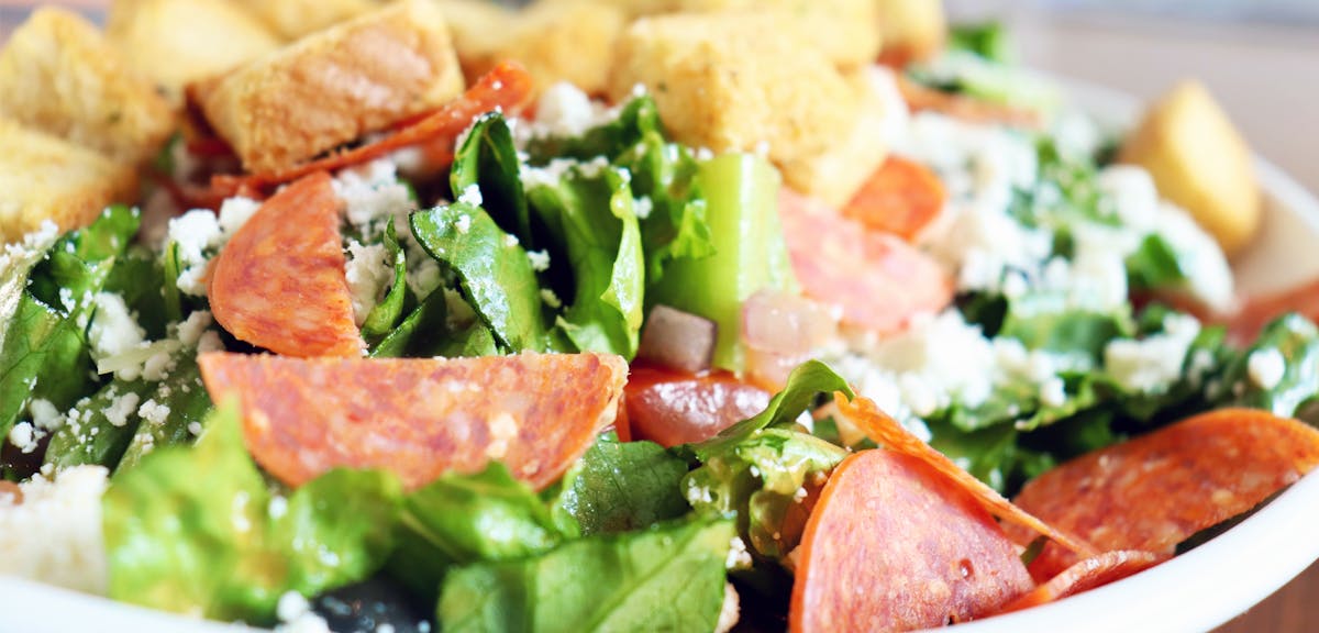 backlot pizza and kitchen catering banner image of salad