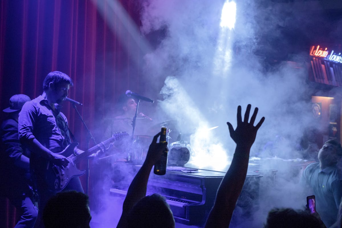 a man standing in front of a stage