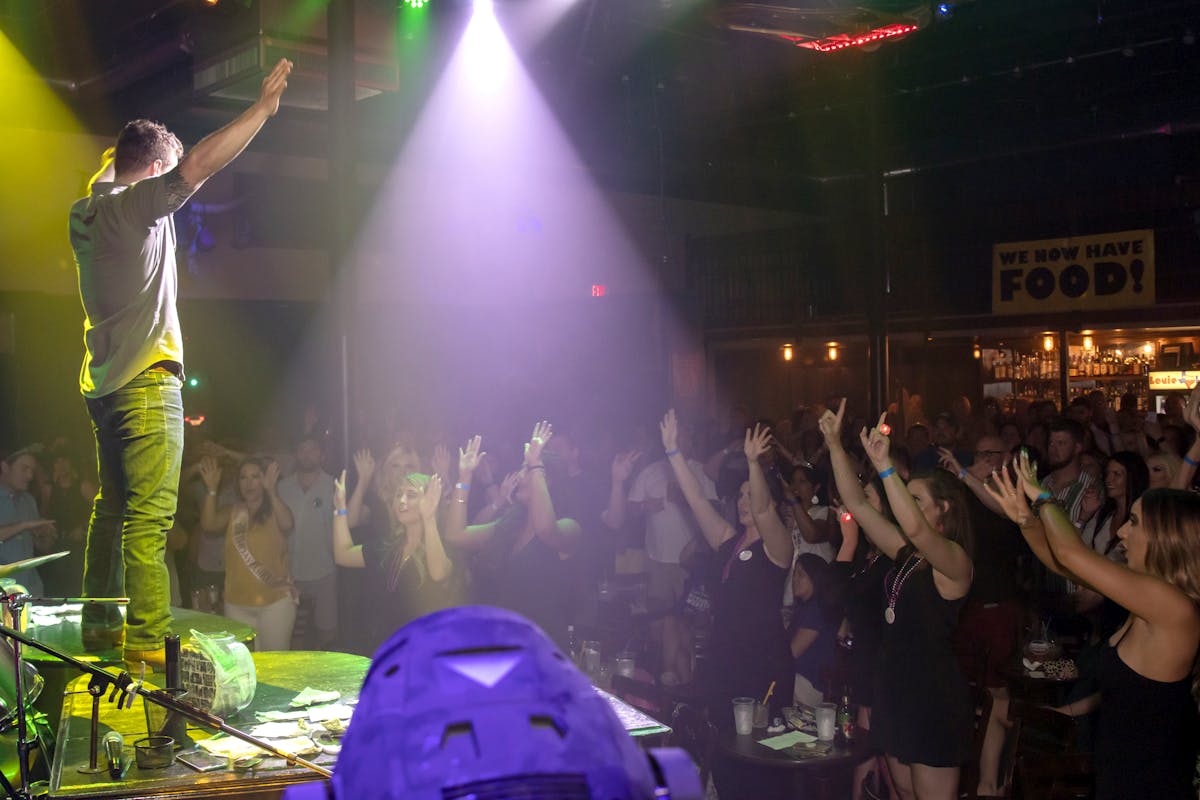 a man standing in front of a crowd