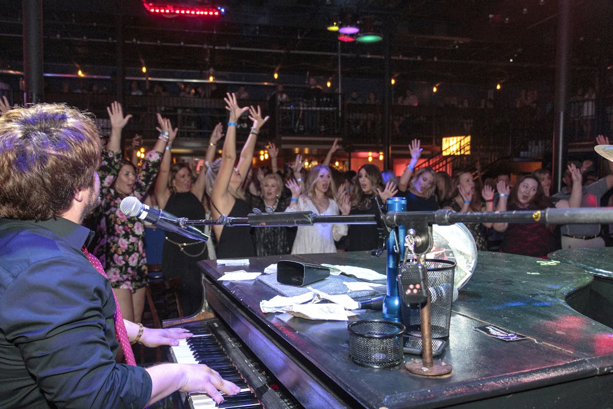 a group of people performing on a counter