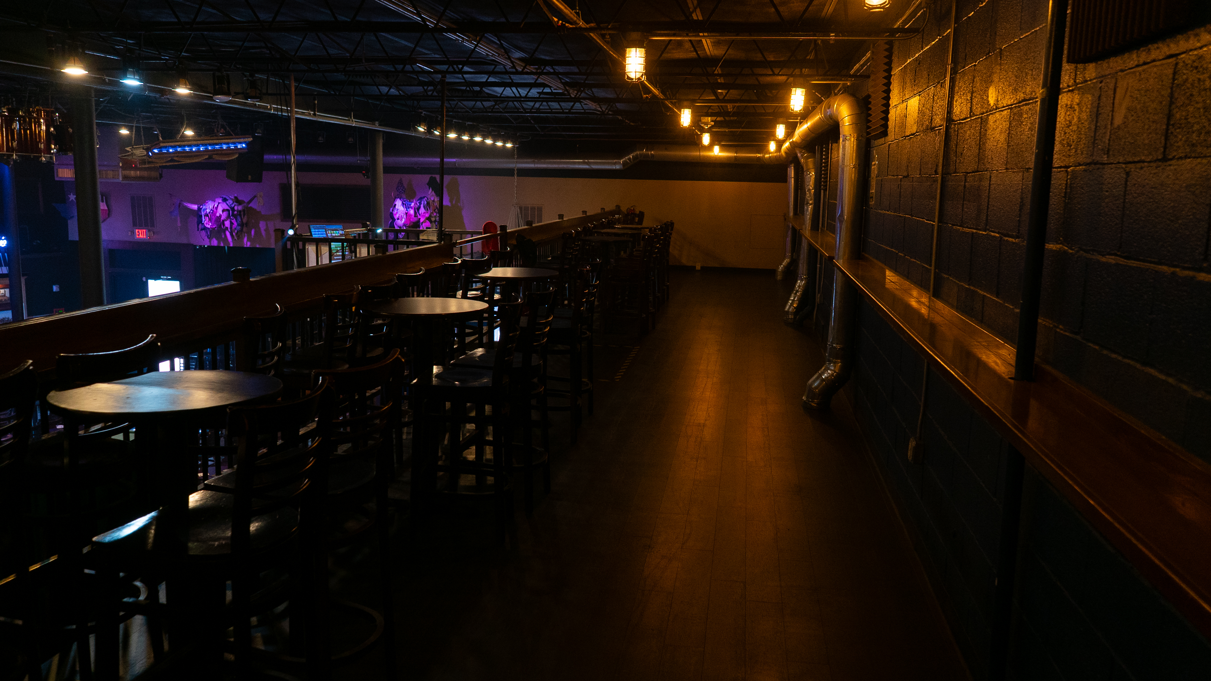 a group of people in a dark room