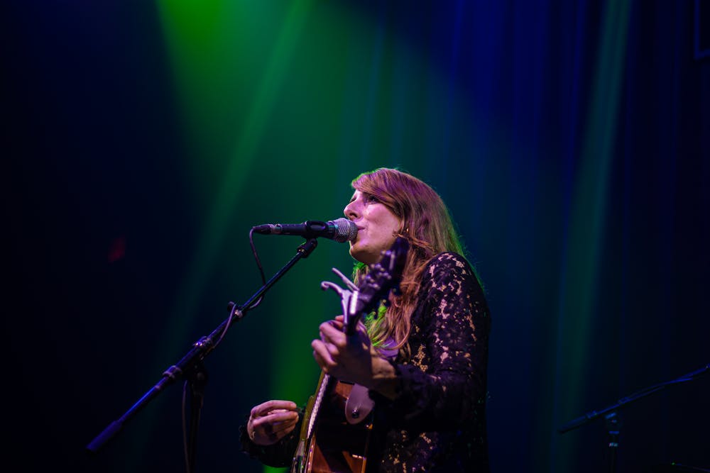 a person standing on a stage