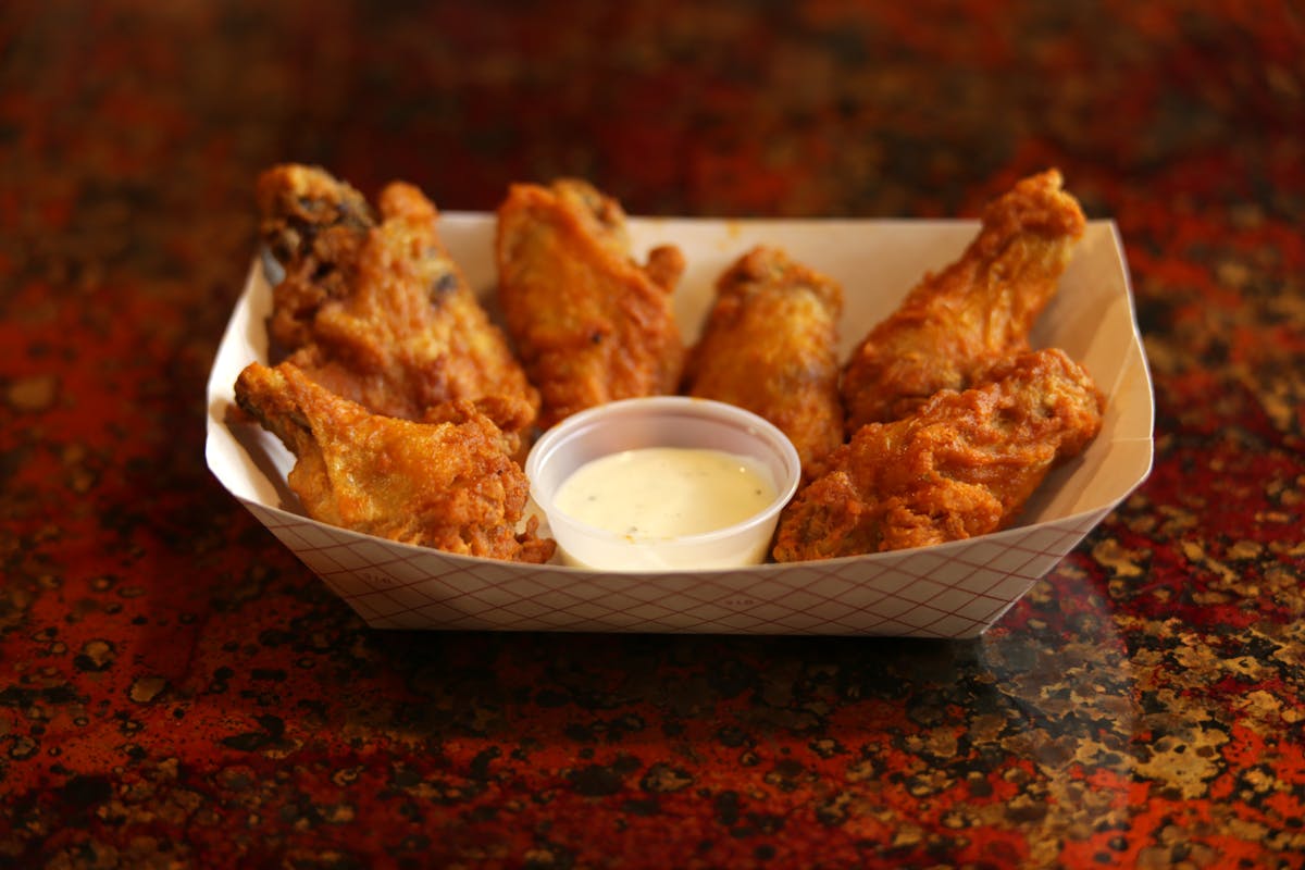 a bowl of food sitting on a table