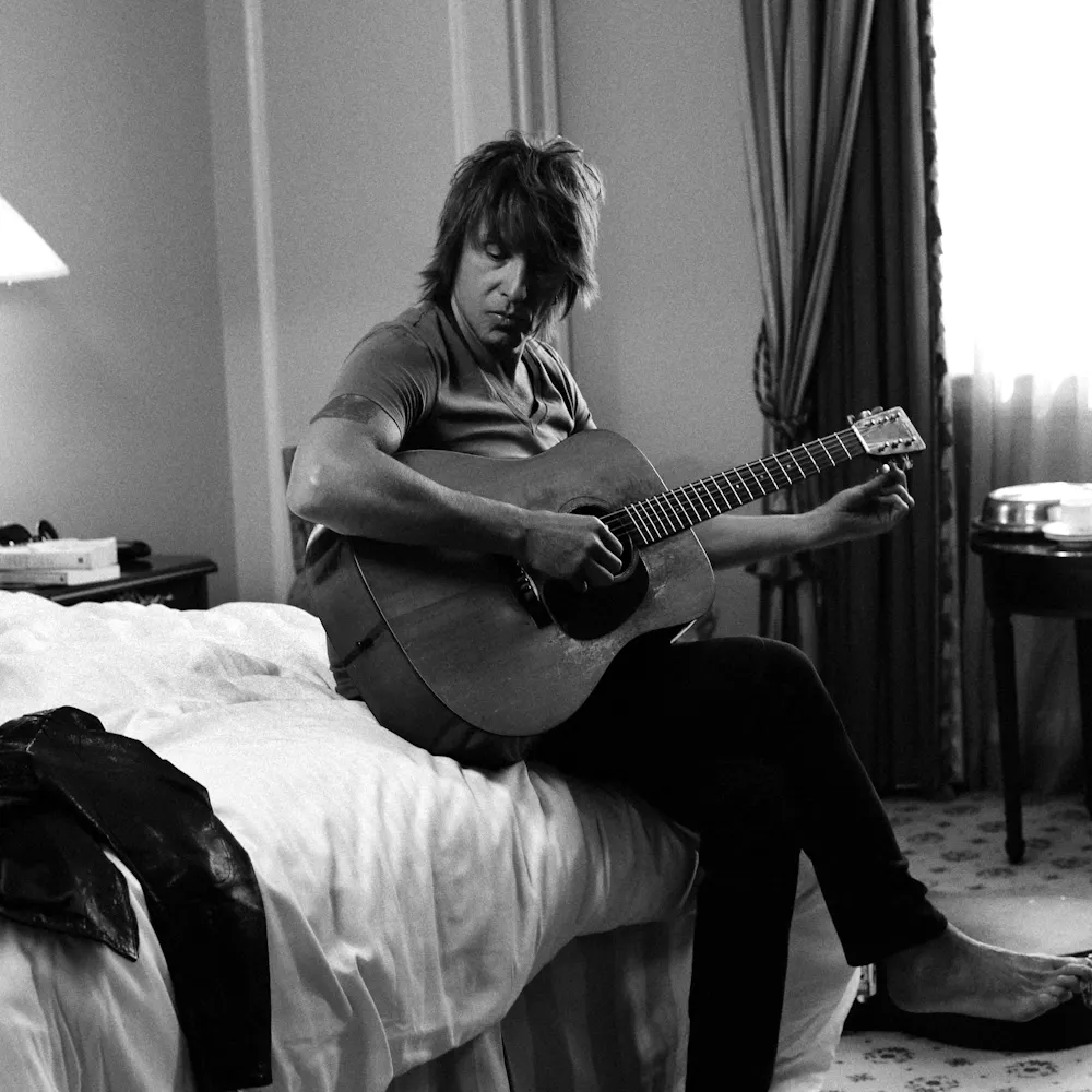 C.C. DeVille with pink hair taking a selfie