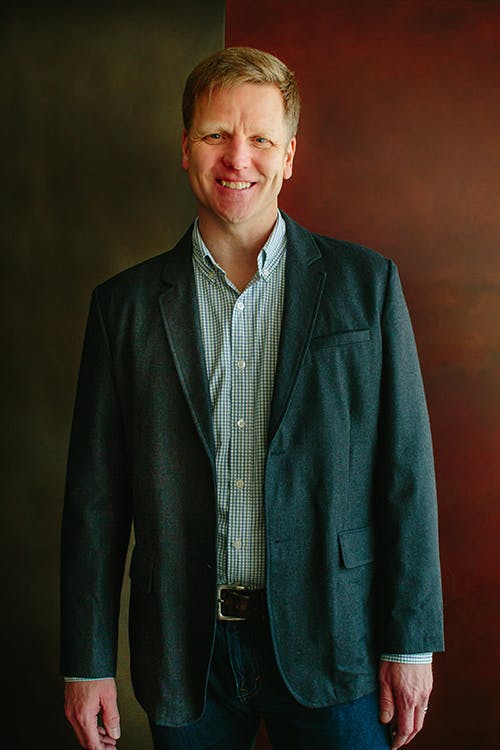 a man wearing a suit and tie