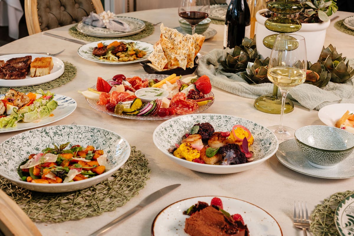 a table topped with plates of food on a plate
