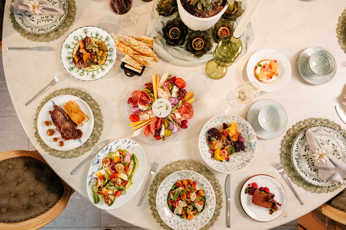 a table topped with plates of food on a plate