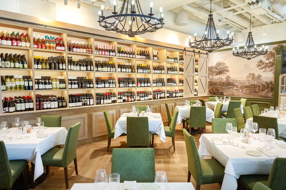 a room filled with furniture and a table in a restaurant