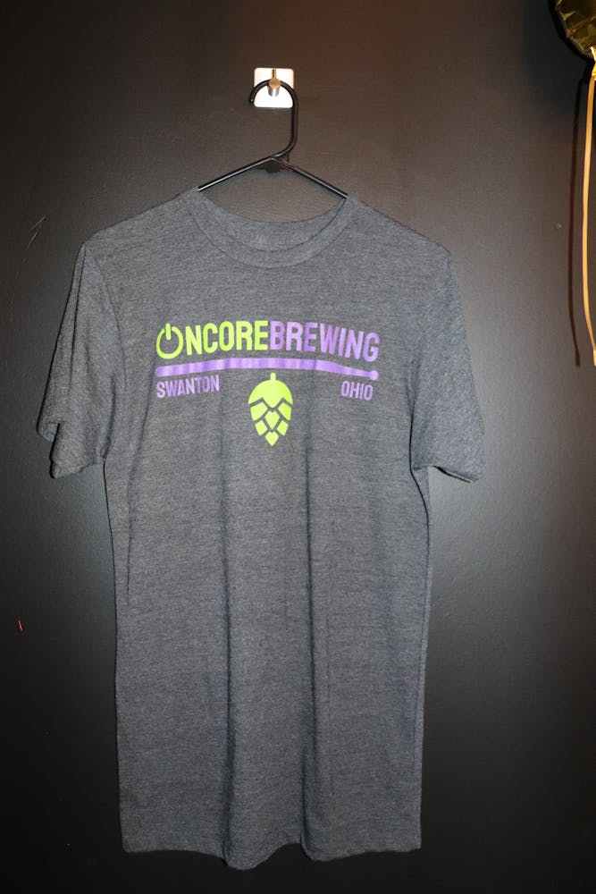 a grey and purple shirt