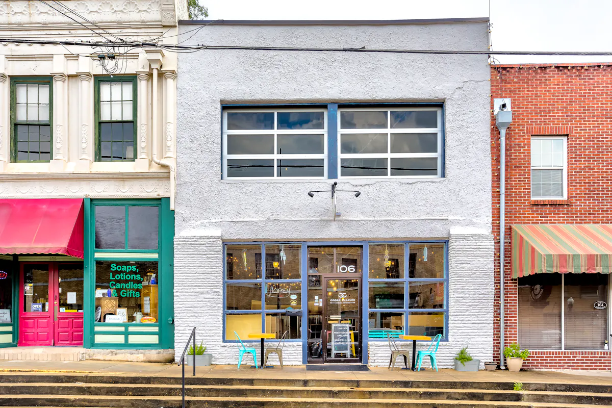 a store front of a brick building