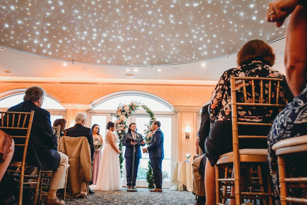 a group of people standing in a room