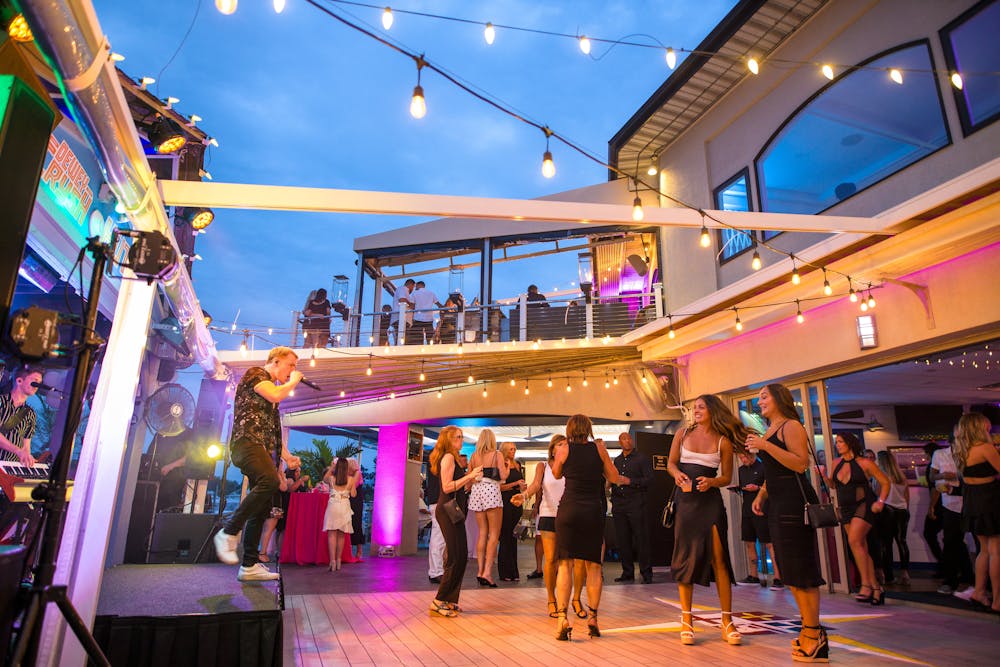 a group of people standing in front of a crowd