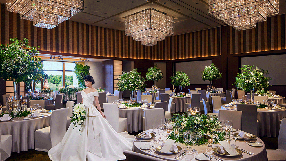 a room filled with furniture and vase of flowers on a table