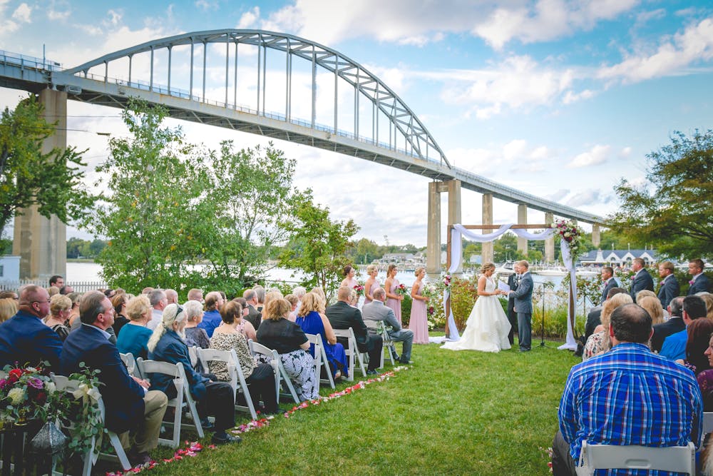 a group of people on a bridge