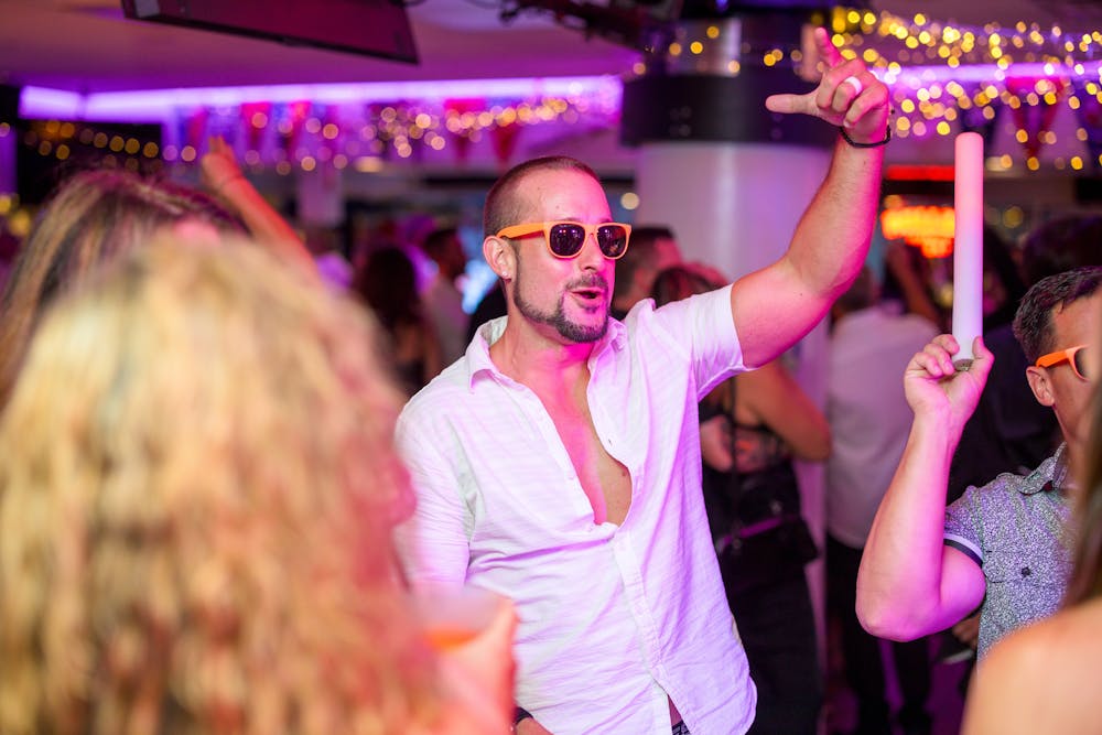 a man standing in front of a store