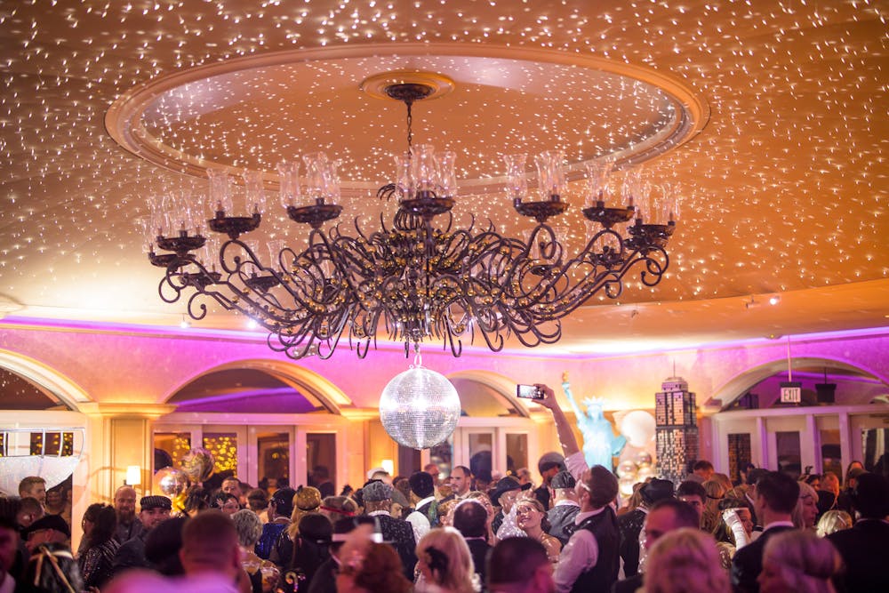 a group of people standing in front of a crowd