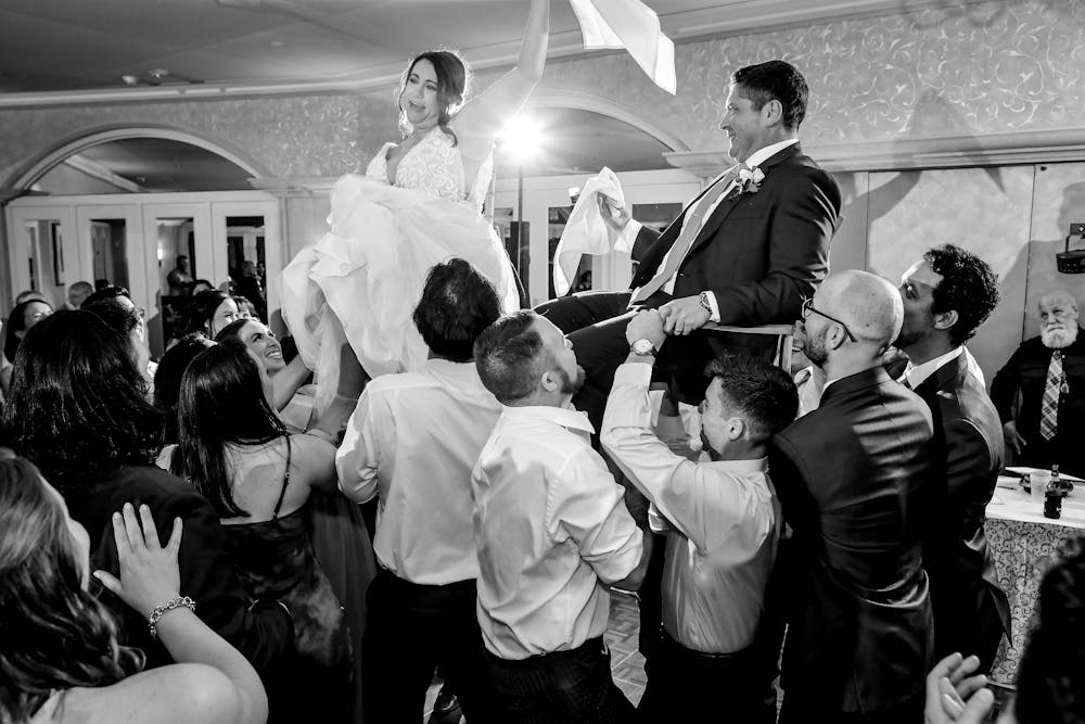 a group of people standing in front of a crowd