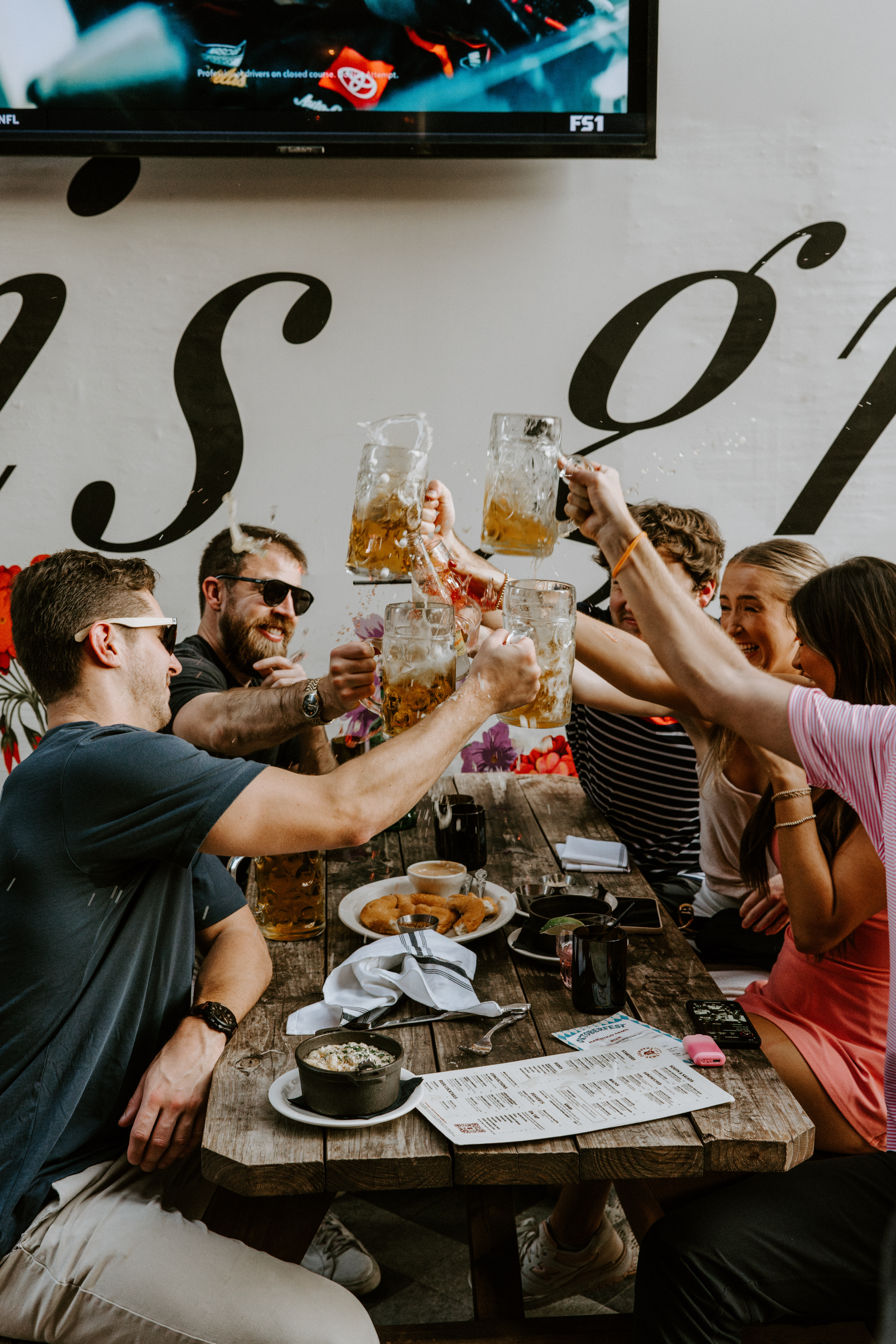 a group of people sitting at a table