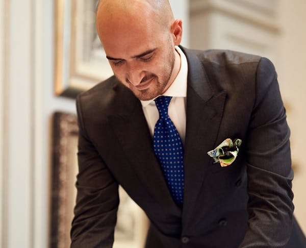 a man wearing a suit and tie