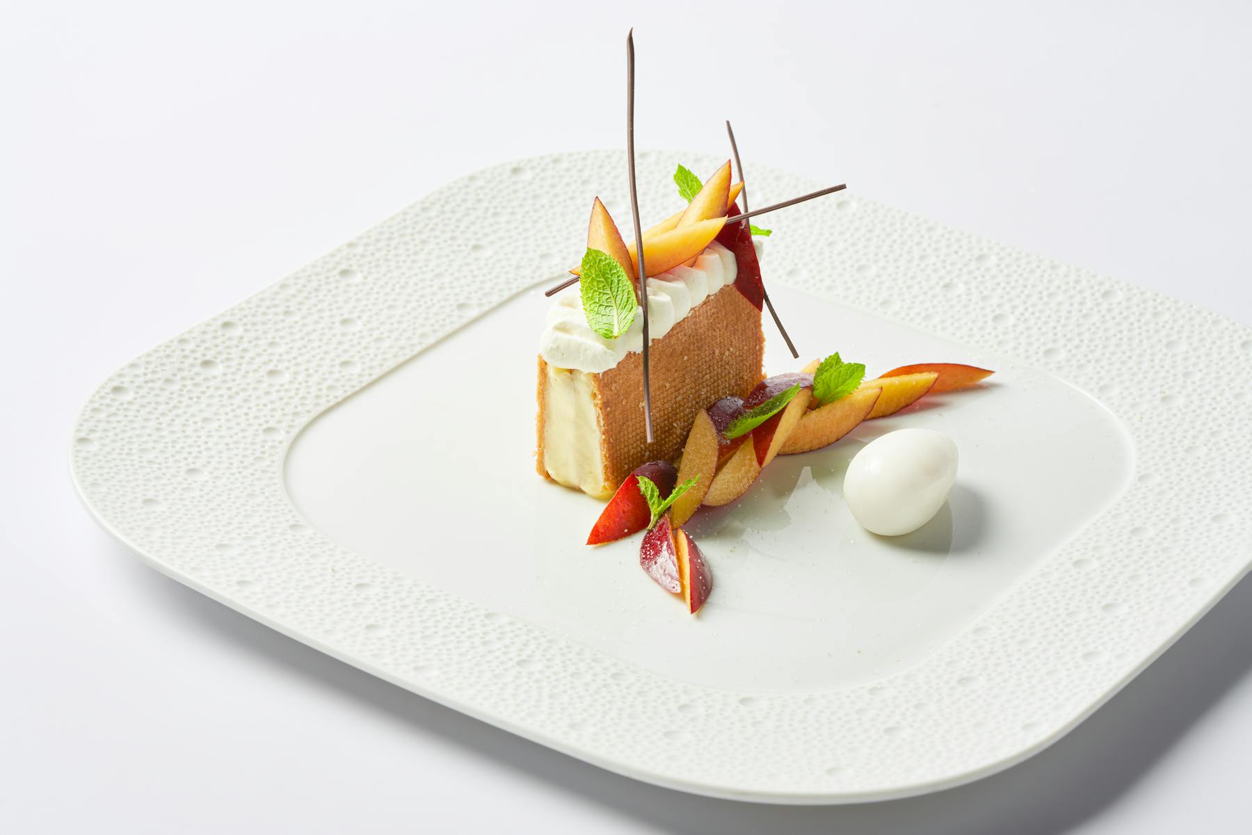 a piece of cake sitting on top of a white plate