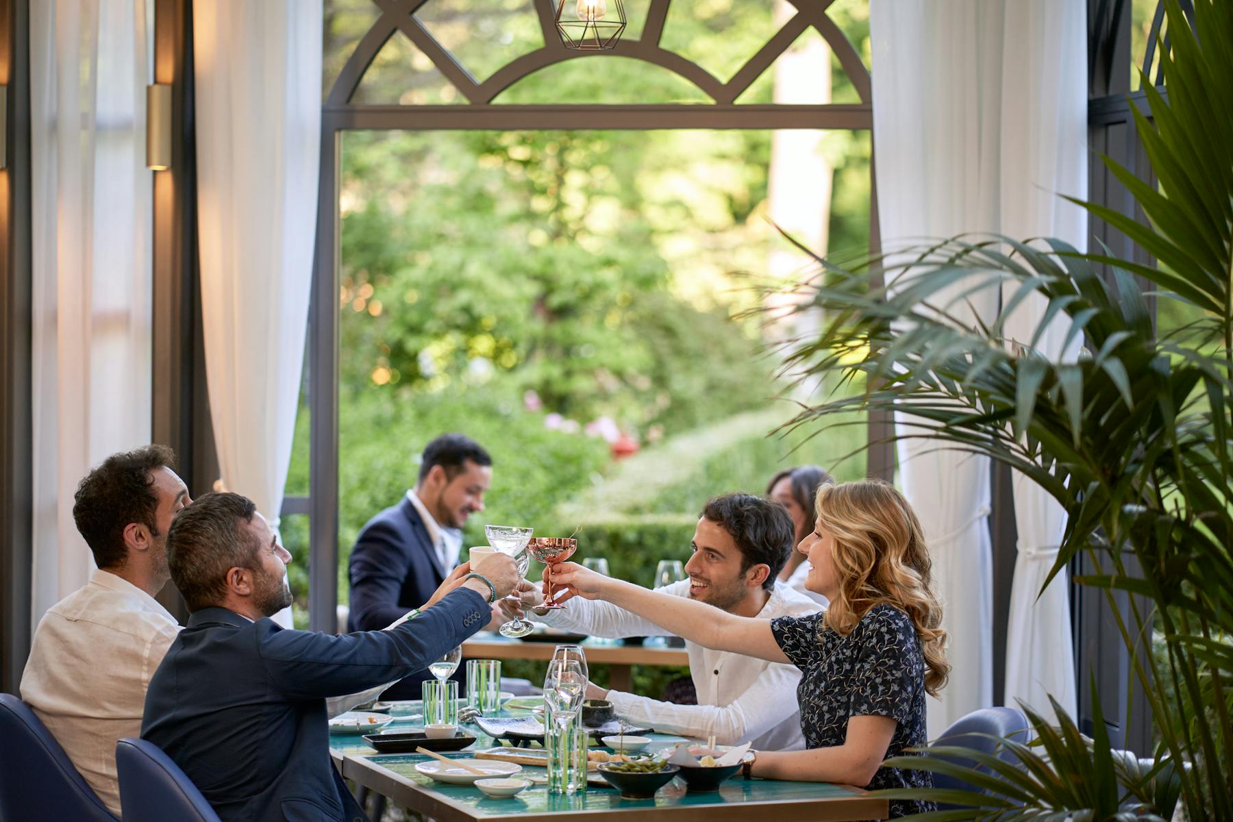 a group of people sitting at a table