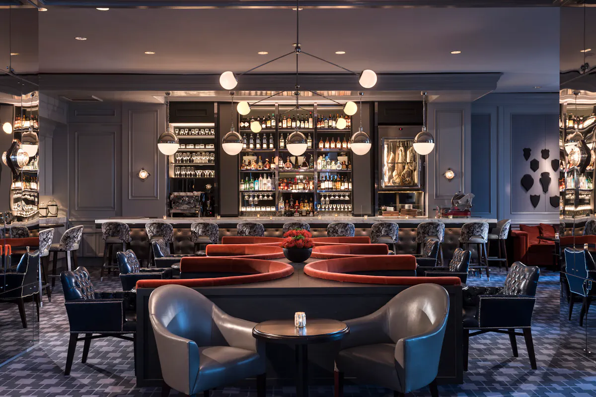 a room filled with furniture and a table in a restaurant