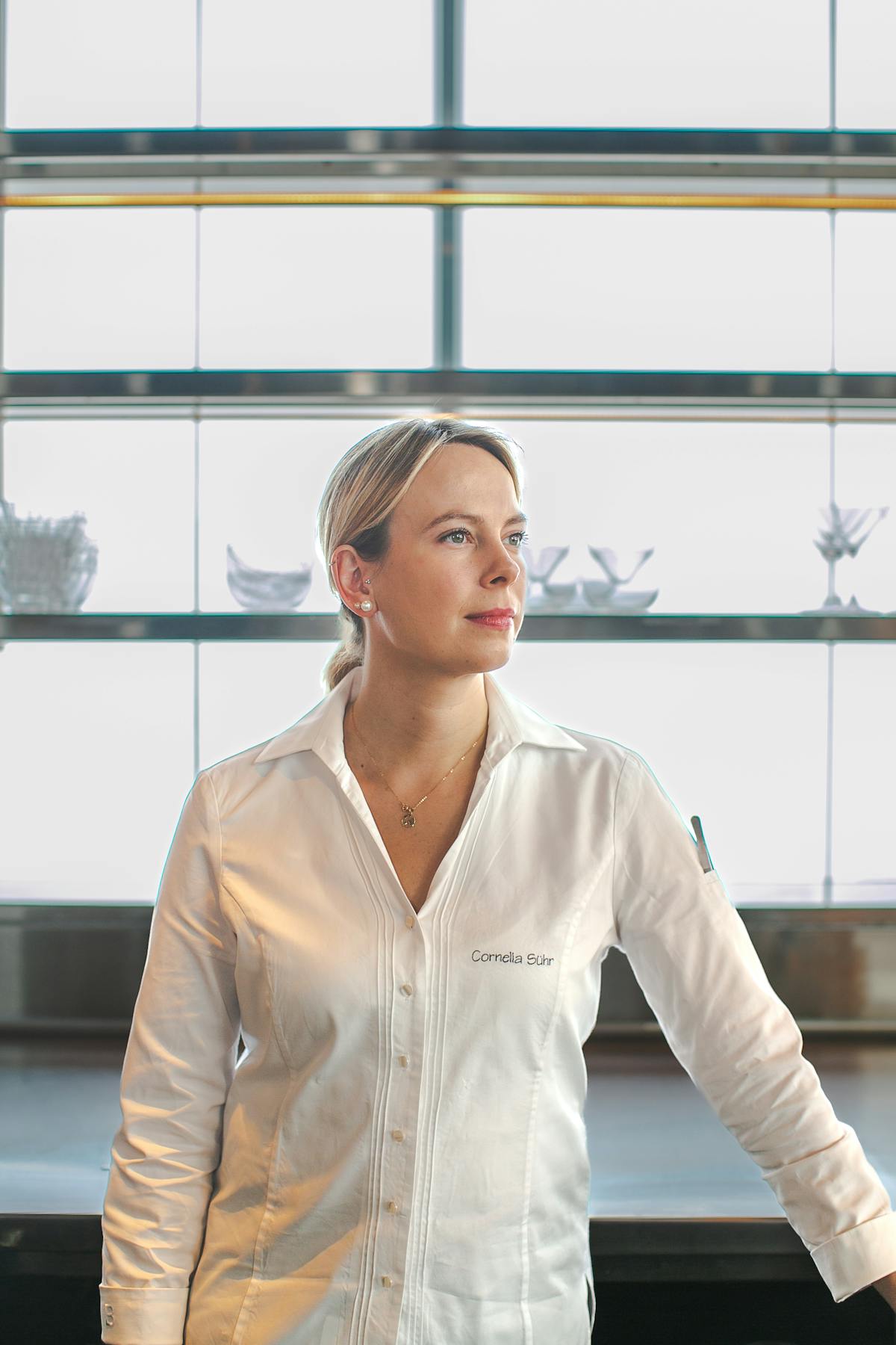 a person standing in front of a window
